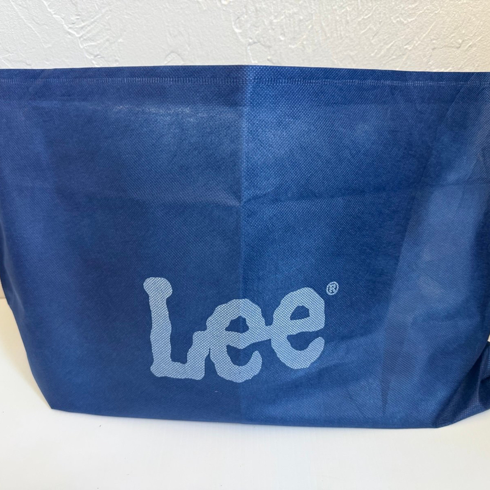 NWT Lee Montana West Pebble Vegan Leather Tote Bag Light Blue Flower Charm
